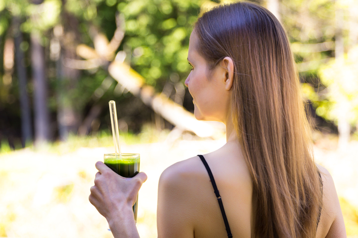Petra Scott holding a green smoothie