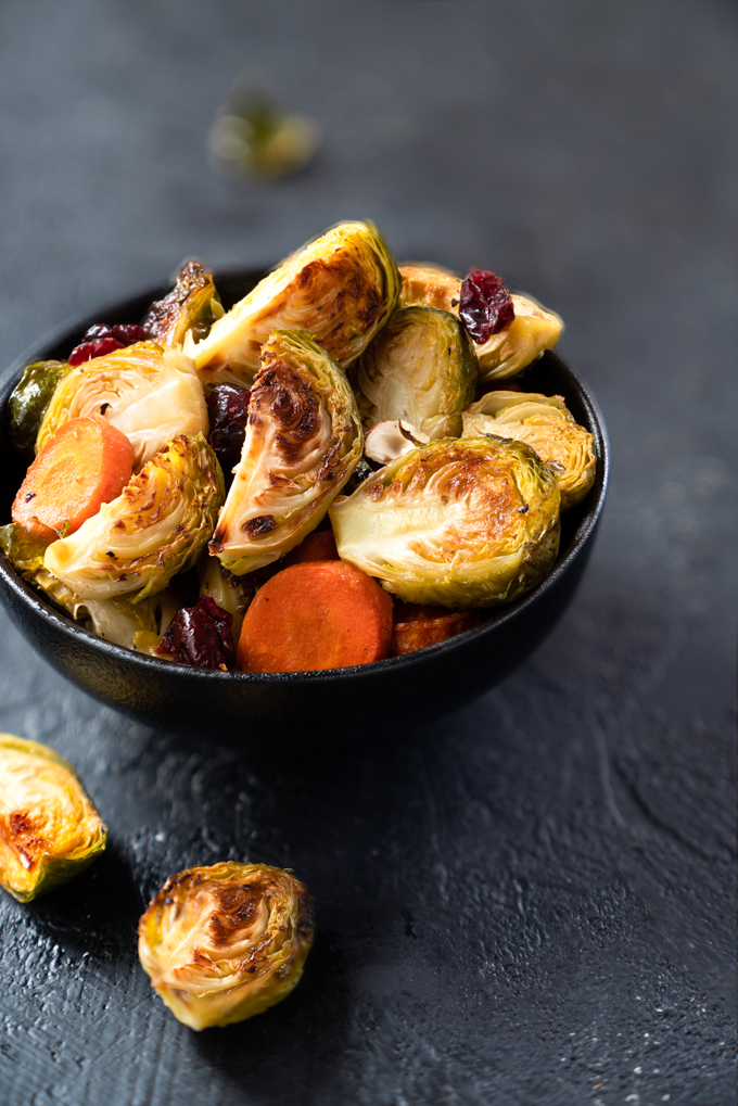 roasted Brussels sprouts with maple syrup, carrots, cranberries, and hazelnuts