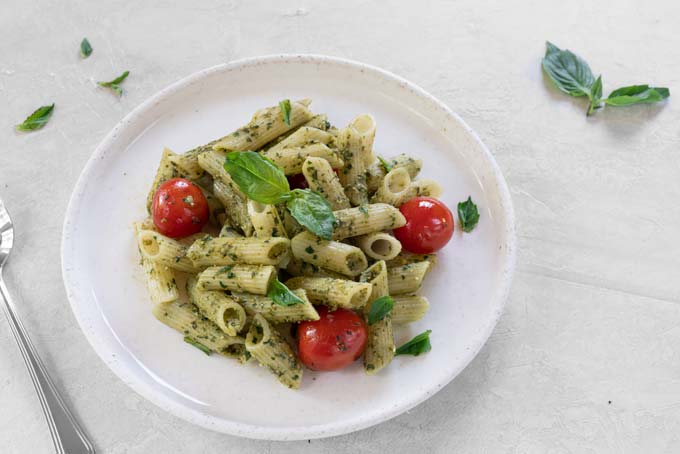 basil pesto pasta with spinach and tomatoes - vegan, paleo, keto