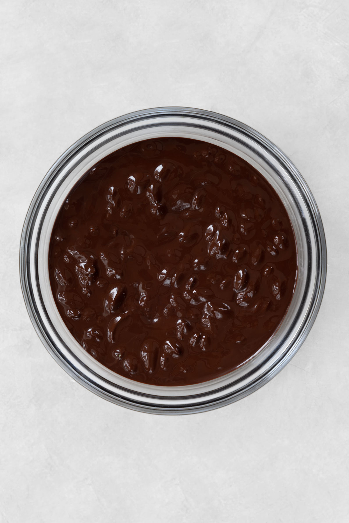 melted dark chocolate with nuts