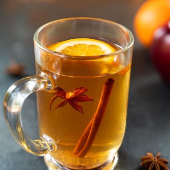 homemade apple cider with cinnamon and cloves
