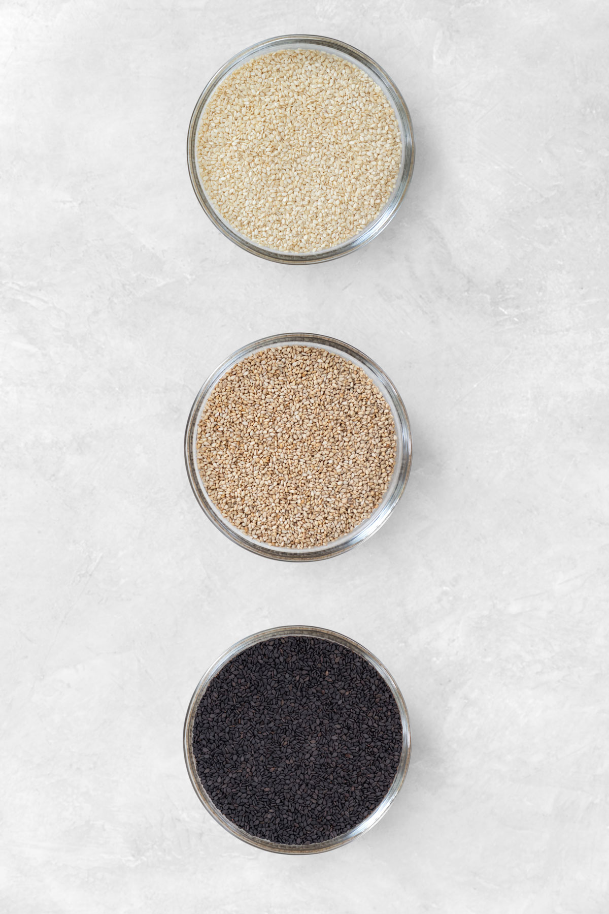 hulled (white) sesame seeds, unhulled (brown) sesame seeds, black sesame seeds